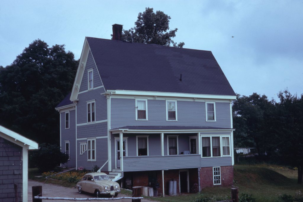 1960s Saab 96 at a farmhouse in New England